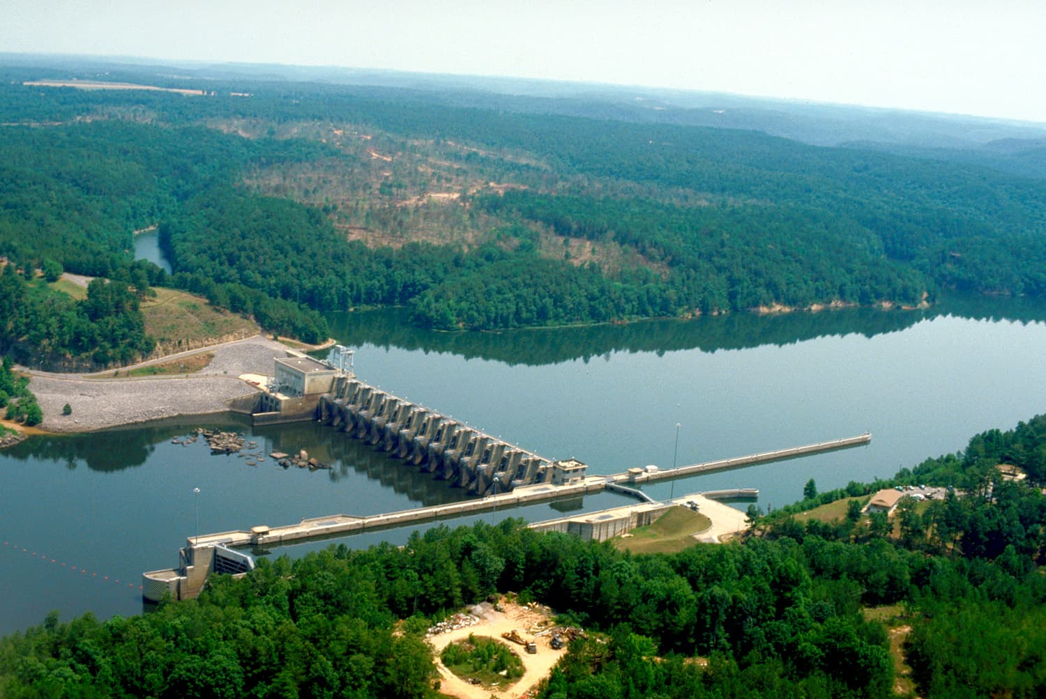 USACE Holt Lock and Dam on the Black Warrior River near Tuscaloosa, Alabama — aerial view of the lock, spillway, and Alabama Power hydroelectric plant