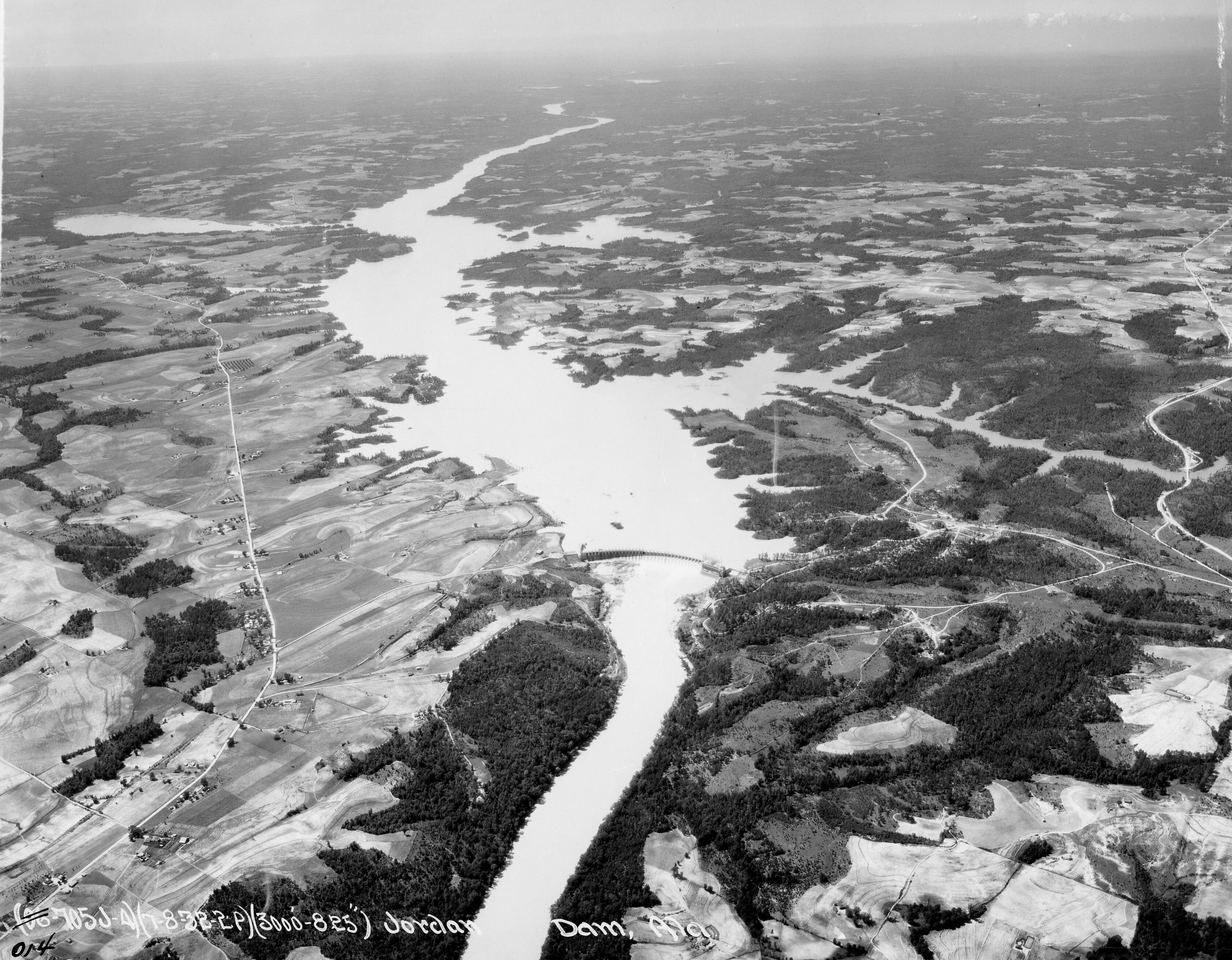 Aerial photograph of Jordan Dam on the Coosa River in Alabama, the 1928 Alabama Power hydroelectric dam that created Lake Jordan